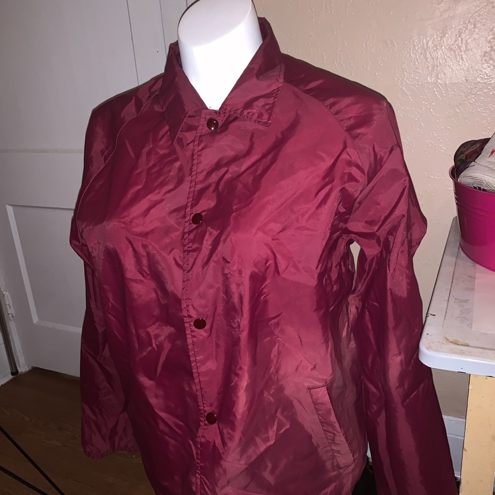 A burgundy Weather breaker